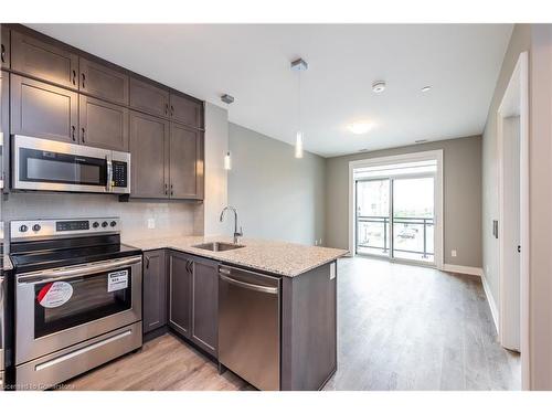 303-50 Kaitting Trail, Oakville, ON - Indoor Photo Showing Kitchen With Stainless Steel Kitchen With Upgraded Kitchen