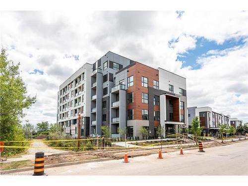 303-50 Kaitting Trail, Oakville, ON - Outdoor With Balcony With Facade