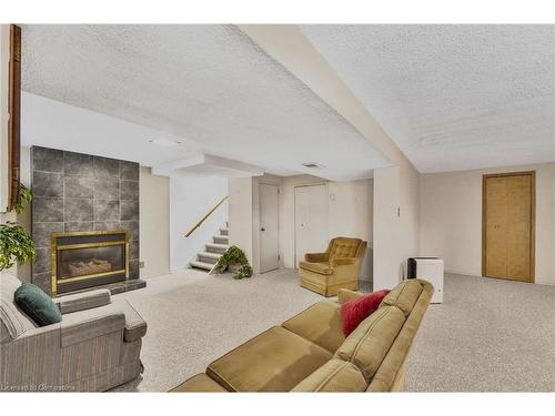 115 Organ Crescent, Hamilton, ON - Indoor Photo Showing Living Room With Fireplace