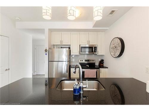 521-101 Shoreview Place, Stoney Creek, ON - Indoor Photo Showing Kitchen With Double Sink