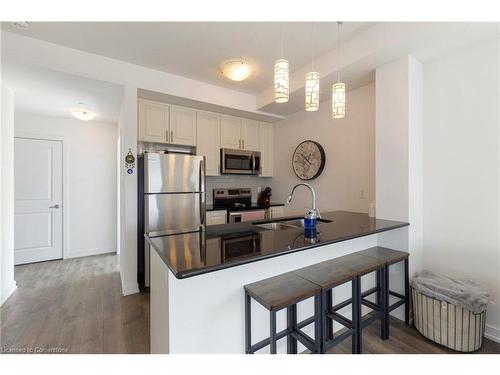 521-101 Shoreview Place, Stoney Creek, ON - Indoor Photo Showing Kitchen With Double Sink