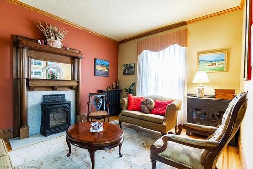 80 Stanley Avenue, Hamilton, ON - Indoor Photo Showing Living Room With Fireplace