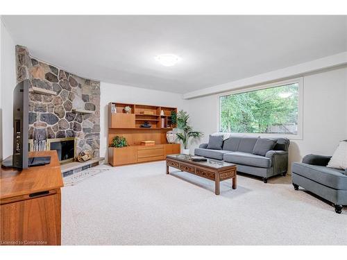 18 Burnt Log Crescent, Toronto, ON - Indoor Photo Showing Living Room With Fireplace