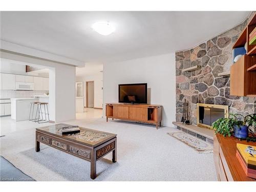 18 Burnt Log Crescent, Toronto, ON - Indoor Photo Showing Living Room With Fireplace