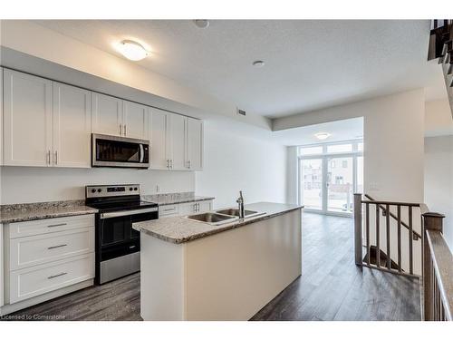 1-261 Skinner Road, Waterdown, ON - Indoor Photo Showing Kitchen With Double Sink