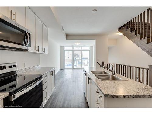 1-261 Skinner Road, Waterdown, ON - Indoor Photo Showing Kitchen With Double Sink