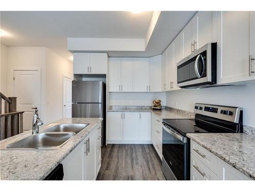 1-261 Skinner Road, Waterdown, ON - Indoor Photo Showing Kitchen With Double Sink