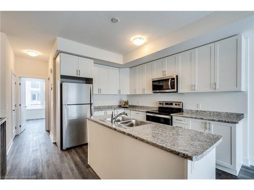 1-261 Skinner Road, Waterdown, ON - Indoor Photo Showing Kitchen With Double Sink