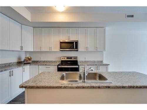 1-261 Skinner Road, Waterdown, ON - Indoor Photo Showing Kitchen With Double Sink