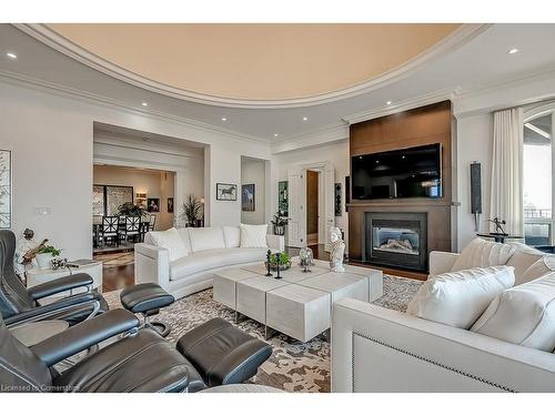 Ph1-445 Elizabeth Street, Burlington, ON - Indoor Photo Showing Living Room With Fireplace