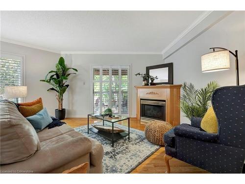 23-2120 Headon Road, Burlington, ON - Indoor Photo Showing Living Room With Fireplace