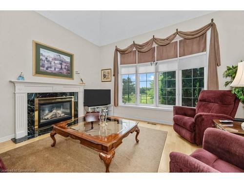 15-2282 Turnberry Road, Burlington, ON - Indoor Photo Showing Living Room With Fireplace