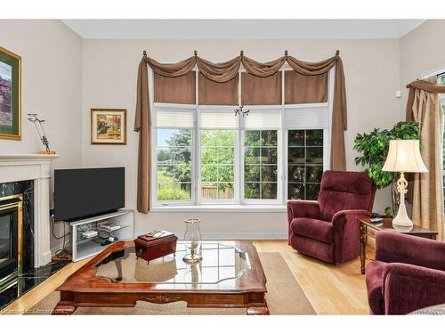 15-2282 Turnberry Road, Burlington, ON - Indoor Photo Showing Living Room With Fireplace