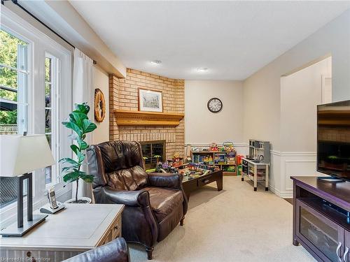 2079 Hunters Wood Drive, Burlington, ON - Indoor With Fireplace