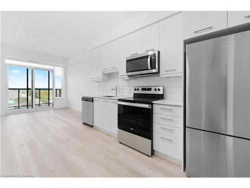 703-385 Winston Road, Grimsby, ON - Indoor Photo Showing Kitchen With Stainless Steel Kitchen