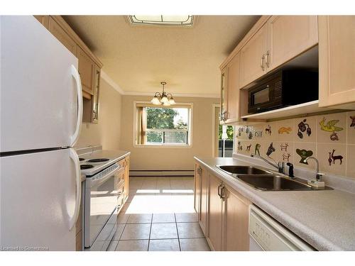 401-2411 New Street, Burlington, ON - Indoor Photo Showing Kitchen With Double Sink