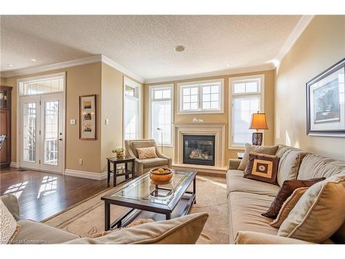 24-875 University Avenue E, Waterloo, ON - Indoor Photo Showing Living Room With Fireplace