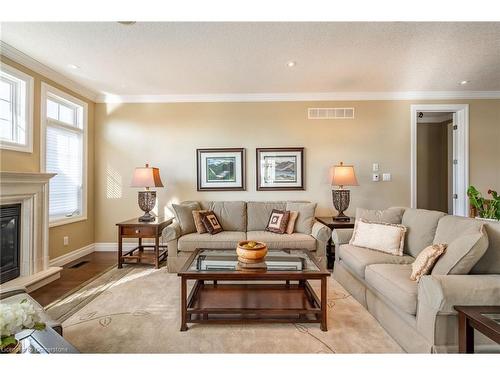 24-875 University Avenue E, Waterloo, ON - Indoor Photo Showing Living Room With Fireplace