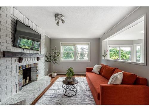 2010 Keller Court, Burlington, ON - Indoor Photo Showing Living Room With Fireplace