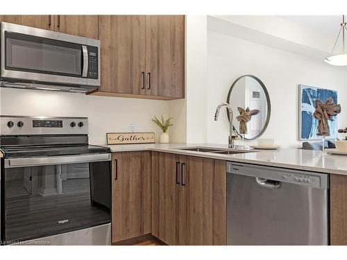 410-120 Spring Valley Crescent, Hamilton, ON - Indoor Photo Showing Kitchen With Stainless Steel Kitchen With Double Sink