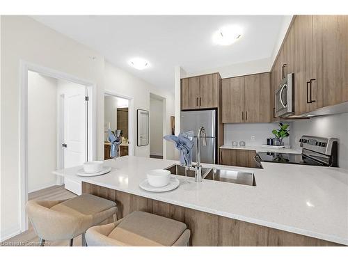 410-120 Spring Valley Crescent, Hamilton, ON - Indoor Photo Showing Kitchen With Double Sink