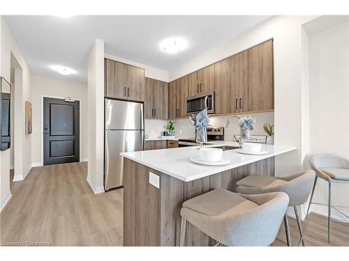 410-120 Spring Valley Crescent, Hamilton, ON - Indoor Photo Showing Kitchen With Stainless Steel Kitchen With Double Sink