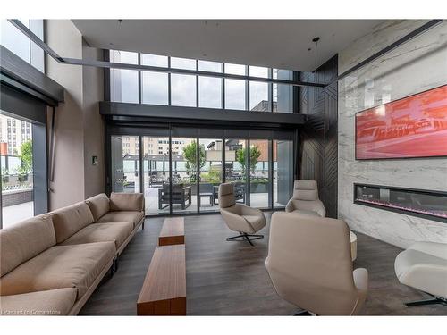 604-8 Hughson Street N, Hamilton, ON - Indoor Photo Showing Living Room With Fireplace