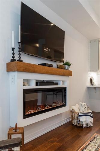 125-30 Times Square Boulevard Boulevard, Stoney Creek, ON - Indoor With Fireplace