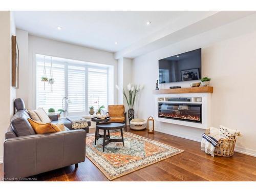 125-30 Times Square Boulevard Boulevard, Stoney Creek, ON - Indoor Photo Showing Living Room With Fireplace