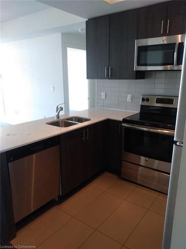 807-550 North Service Road, Grimsby, ON - Indoor Photo Showing Kitchen With Double Sink