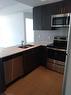 807-550 North Service Road, Grimsby, ON  - Indoor Photo Showing Kitchen With Double Sink 