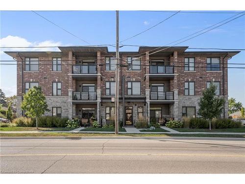 112-257 Millen Road, Stoney Creek, ON - Outdoor With Balcony With Facade