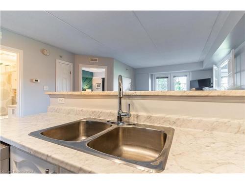 213-1480 Bishops Gate, Oakville, ON - Indoor Photo Showing Kitchen With Double Sink