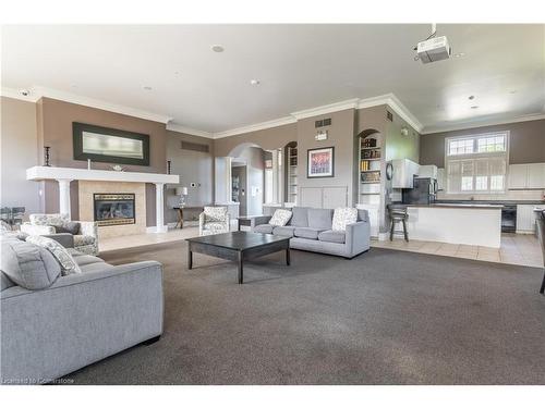 213-1480 Bishops Gate, Oakville, ON - Indoor Photo Showing Living Room With Fireplace