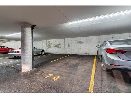 213-1480 Bishops Gate, Oakville, ON - Indoor Photo Showing Garage