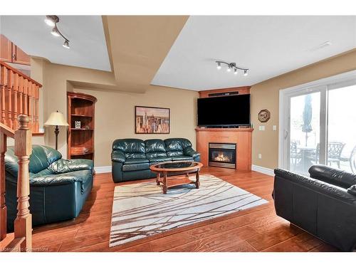 112 Redfern Avenue, Hamilton, ON - Indoor Photo Showing Living Room With Fireplace