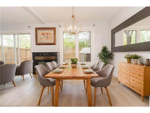 11-1270 Gainsborough Drive, Oakville, ON - Indoor Photo Showing Dining Room With Fireplace