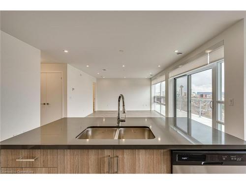 604-479 Charlton Avenue E, Hamilton, ON - Indoor Photo Showing Kitchen With Double Sink