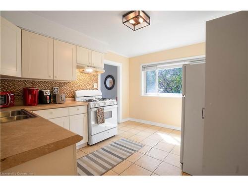 197 Fennell Avenue E, Hamilton, ON - Indoor Photo Showing Kitchen With Double Sink