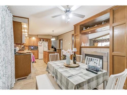 1161 4Th Concession Rd W, Flamborough, ON - Indoor Photo Showing Dining Room With Fireplace