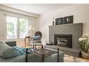 4 Knollwood Court, Dundas, ON  - Indoor Photo Showing Living Room With Fireplace 