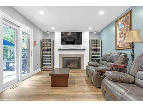 64 Hildegard Drive, Hamilton, ON - Indoor Photo Showing Living Room With Fireplace