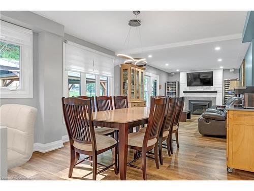 64 Hildegard Drive, Hamilton, ON - Indoor Photo Showing Dining Room With Fireplace