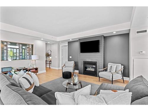 409-11 Bronte Road, Oakville, ON - Indoor Photo Showing Living Room With Fireplace