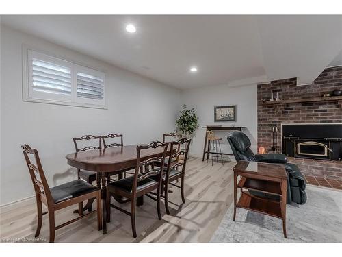 18 Ilona Court, Brantford, ON - Indoor Photo Showing Dining Room With Fireplace