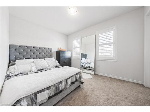 11 Mcwatters Street, Binbrook, ON - Indoor Photo Showing Bedroom