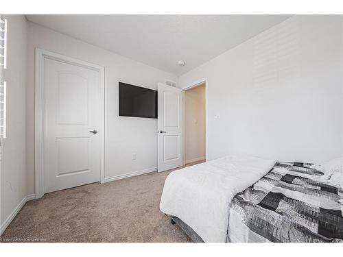 11 Mcwatters Street, Binbrook, ON - Indoor Photo Showing Bedroom