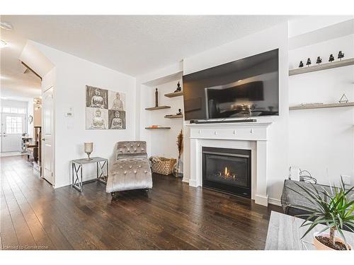 11 Mcwatters Street, Binbrook, ON - Indoor Photo Showing Living Room With Fireplace