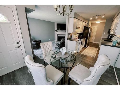 170 Candlewood Drive, Hamilton, ON - Indoor Photo Showing Dining Room With Fireplace