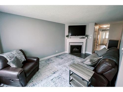 170 Candlewood Drive, Hamilton, ON - Indoor Photo Showing Living Room With Fireplace